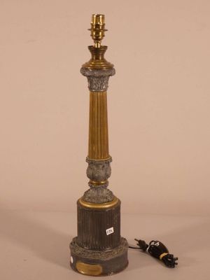 a lamp that is sitting on a table next to a cord