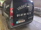 a van that is parked in a parking garage