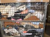 a cart with a bunch of stuffed animals in it