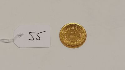 une image représentant une pièce d'or sur laquelle est accrochée une étiquette