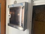 an image of a stainless steel oven in a kitchen