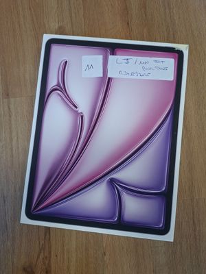 a picture of a picture of a purple flower on a table