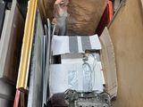 a box full of assorted items sitting on the floor