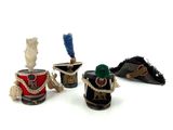 several different types of tin cans are lined up on a white surface