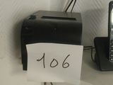 a picture of a cell phone on a wall with a note attached to it