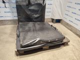 an image of a piece of metal sitting on a pallet