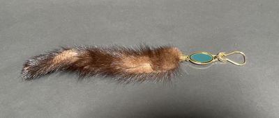 brown fur keychain with turquoise stone charm
