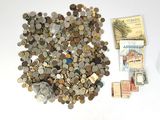 a pile of coins and money sitting on a table