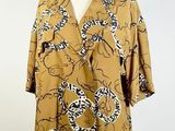 an image of a mannequin mannequin with a leopard print shirt on it