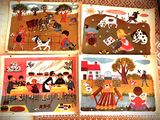 quatre dessins d'enfants représentant une scène de ferme sont présentés dans un livre