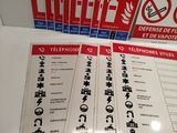 four signs on the table that show different types of fire extinguisors