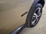 a close up of a car ' s tire on the street