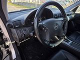 a car with a steering wheel and a dash board
