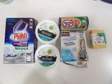 several different types of toothpaste on a table