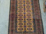 several rugs are laid out on the floor in a room