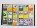 a lot of pokemon cards on the table together