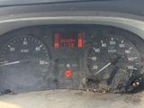 a close up of a speedometer in a car