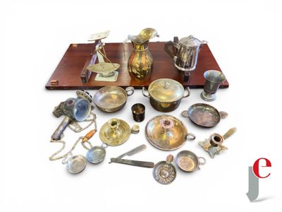 a lot of silver and brass items on a table