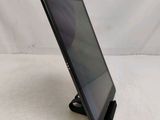 a close up of a tablet computer on a stand on a table
