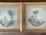 deux tableaux encadrés représentant un paysage avec un homme et une femme