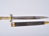 pair of two old knives on a white surface