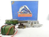 a box of train hornby toys on a table