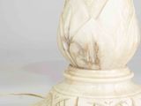 an image of a white marble table lamp with a marble base