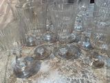 a lot of empty glasses on the table