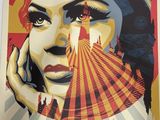 an image of a poster with a woman ' s face on it