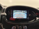 a car dashboard with a game on the screen