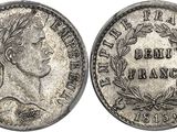 a silver coin with an image of a woman on it