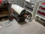 an image of a garage with a propanent and other tools