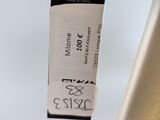 a picture of a gold umbrella with a price tag attached to it