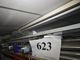 a picture of a number sign on a shelf in a room