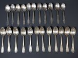 a lot of spoons and spoon spoons on the table