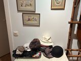 a table with a hat on top of it in a room