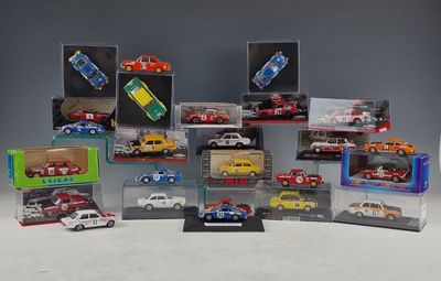 a lot of toy cars that are in a display case