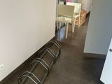 a bike rack in the middle of a hallway