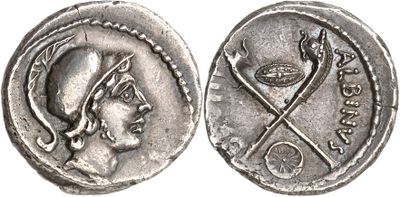 a close up of a silver coin with a woman on it