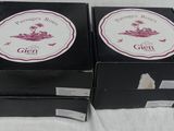 two boxes that are sitting on a table
