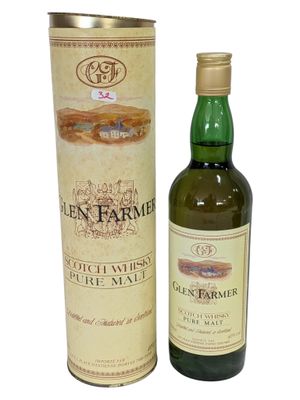 an image of a bottle of wine next to a cardboard box
