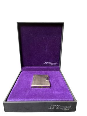 an image of a purple box with a lighter inside of it