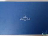 a blue box with a white logo on it sitting on a table