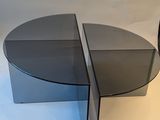 two tables that are sitting side by side on a white background