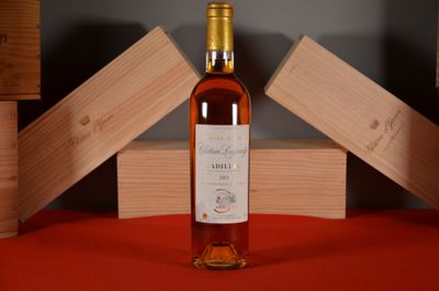 a bottle of wine that is sitting on a table