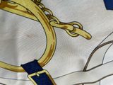 a close up of a tie with a horse on it