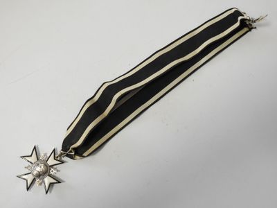 Gros plan sur une médaille portant une étoile