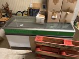 a counter with a glass top in a room