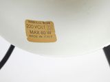 an image of a close up of a lamp with a tag on it