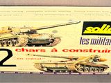 a box with two tanks on it on a table